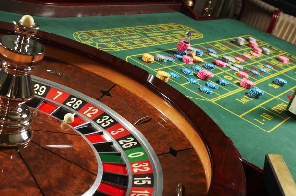 Diamond Empire slot game interface on mobile phone showing five reels with gem symbols